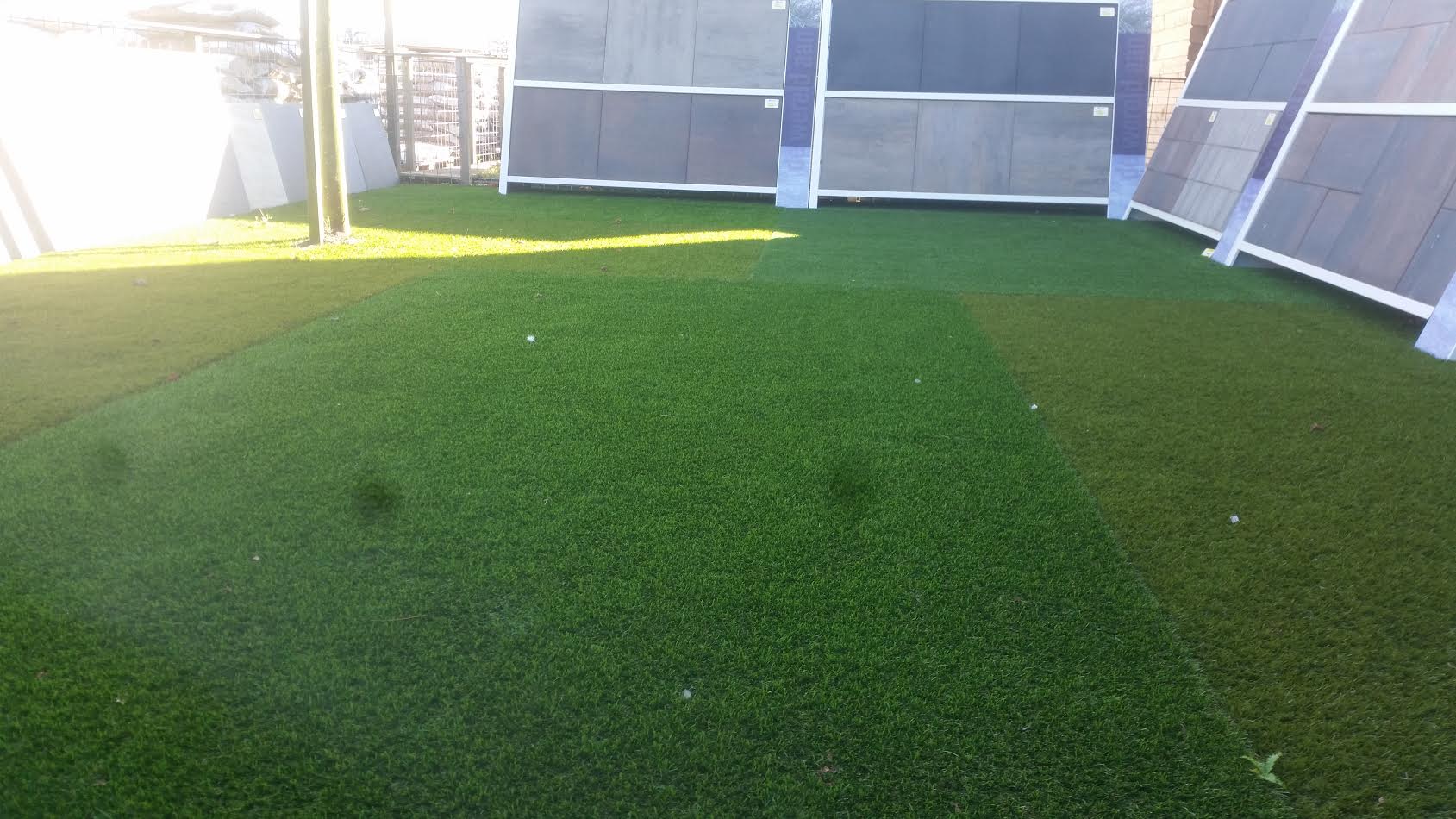Showtuin kunstgras ZAM Sierbestrating Tuinhout & Hoveniers